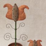Fancy Potted Tulip Designed by Tish Bachleda. Available in Medium and Small Sizes.