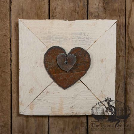 Two Rusty Steel Hearts Mounted on Vintage White Wood Frame design by Tish Bachleda