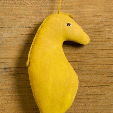 Mustard Seahorse ornament designed by Tish Bachleda