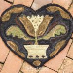 Tulip Heart Hooked rug Designed by Tish Bachleda